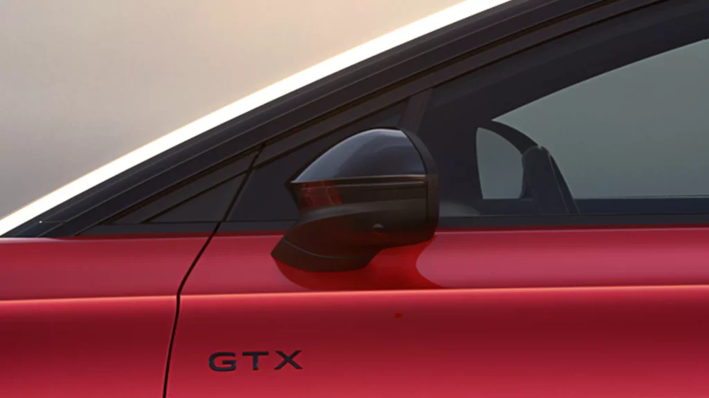 2023 Volkswagen ID.7 GTX. Imagen adelanto emblema.