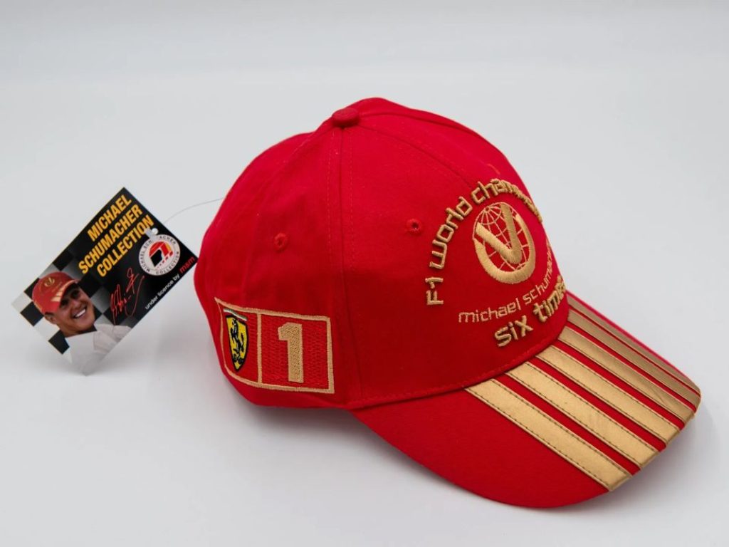 Los recuerdos de Michael Schumacher a subasta: cascos, guantes, monos de carreras y mucho más 12 Motor16 2003 Michael Schumacher Commemorative Six Time World Champion Cap Motor16