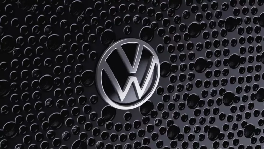 2024 Volkswagen RooBadge emblema 9 Motor16
