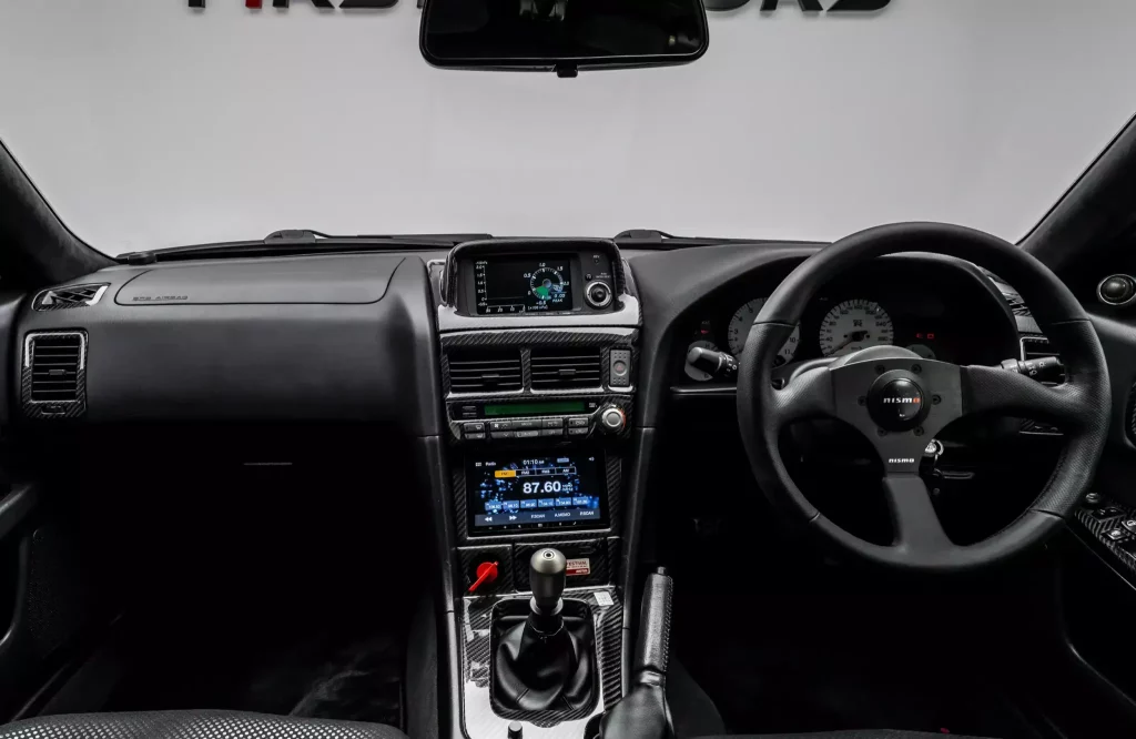 Nissan Skyline GT-R R34 V-Spec II Nismo Clubman Race Spec: Tan exótico que apunta a los siete dígitos 3 Motor16 2001 Nissan Skyline GT-R R34 Clubman. Imagen interior.