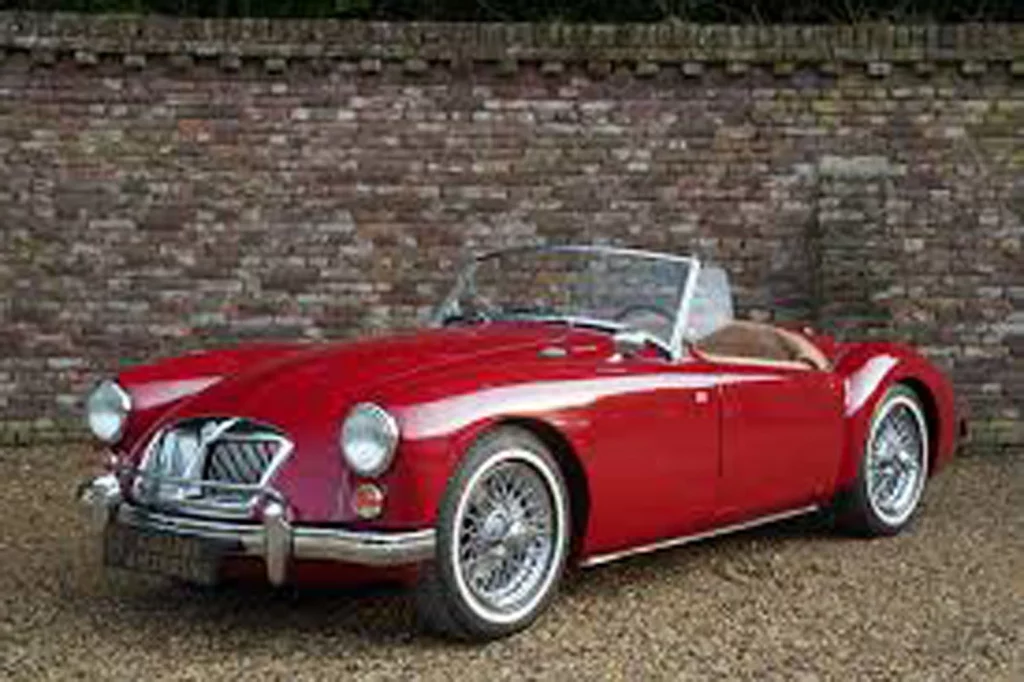 100 ANOS DESCAPOTABLES MG 17. MG A 1955–1962 Motor16