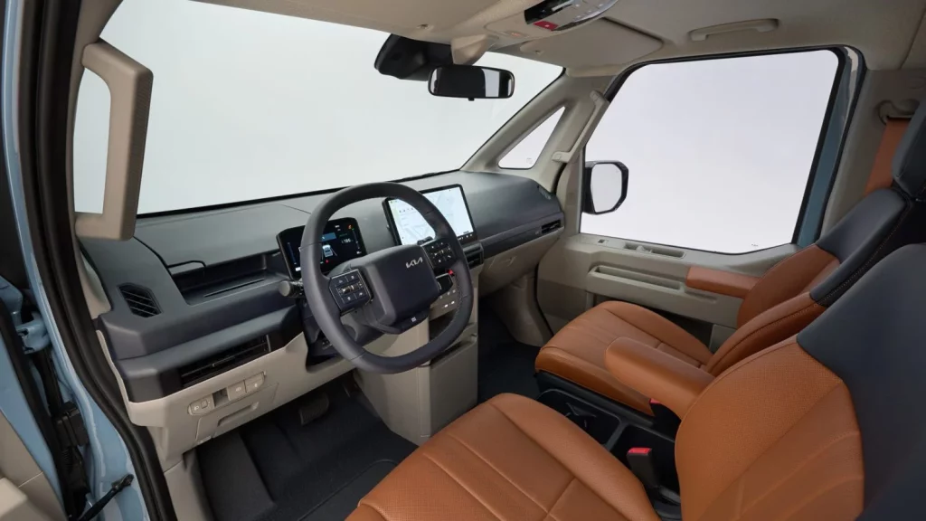 kia pv5 passenger frost blue int studio static digital 1920x1080 001 Motor16