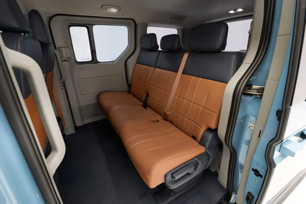 kia pv5 passenger frost blue int studio static highres 002 Motor16